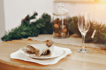 Gala dinner. Cooking at Christmas. New year's interior in the kitchen. Decorations: Christmas tree,...