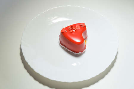 heart-shaped cake on February 14.food, cheesecake for Valentine's day on a white background.の写真素材
