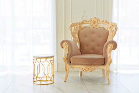 interior in the Baroque, Empire style. rooms in bright colors: marble floor, large windows, small sofa, chandelierの写真素材