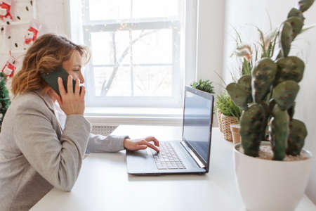 office concept, business plan, fashion-businesswoman in black and yellow suit talking on the phone...