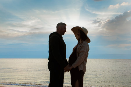a guy and a girl on the sea. Couple love in water. people on the beach