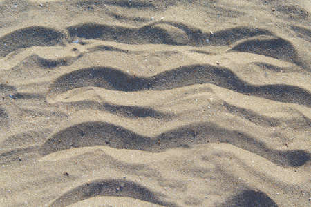 Sand Texture. Brown sand. Background from fine sand. Sand backgroundの写真素材