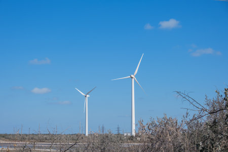 Windmills against the blue sky. High quality photo