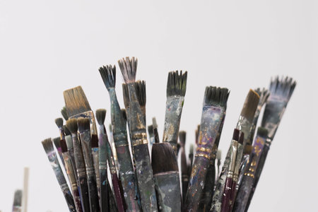 Brushes and spatulas on a white background. The tools of an artist or a sculptor for drawing....