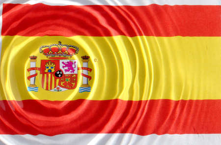 	 Spain flag under water with nice circles and ripplesの写真素材