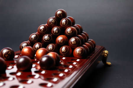 Bingo table whit balls on pyramid 