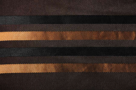 shiny luxury  silk fabric with golden stripesの写真素材