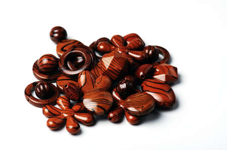 brown  wooden jewelery accessories ,isolated on white backgroundの写真素材