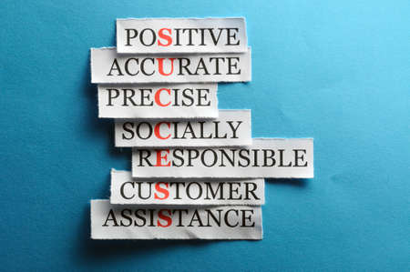 Success  acronym  in business concept, words on cut paper hard lightの写真素材