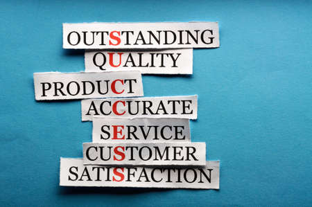 Success  acronym  in business concept, words on cut paper hard lightの写真素材