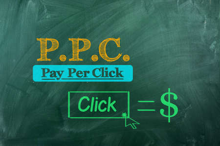 Pay per click acronym concept on green chalkboardの写真素材