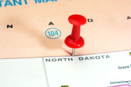 Close up of North Dakota  state USA map with red pin - Travel conceptの写真素材