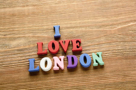 I LOVE LONDON - words  made from multicolored   letters on wooden  backgroundの写真素材