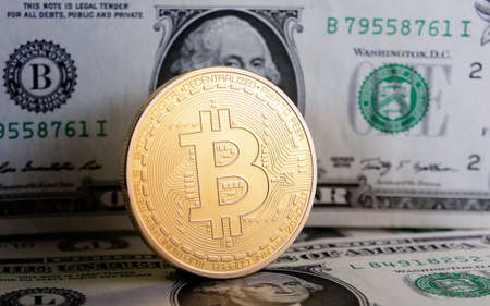 Bitcoin on one  dollar banknote. Trading concept .のeditorial素材