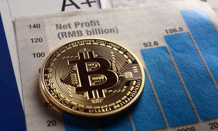 A golden bitcoin on graph and diagrams  background. concept of trading  crypto currencyのeditorial素材