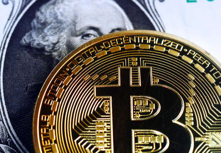 Bitcoin on one  dollar banknote. Trading concept .