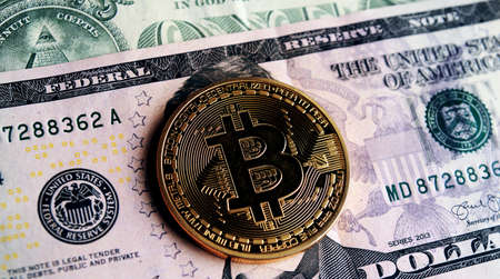  Bitcoin on five dollar banknote. Trading concept .の写真素材
