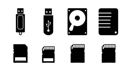 Six unique black solid filled silhouettes of data storage devices including USB drives, external...