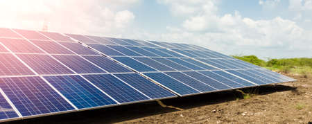 Installed Photovoltaic solar panels / modules at solar power station. Clear sky sunny day clear closeup view.の写真素材