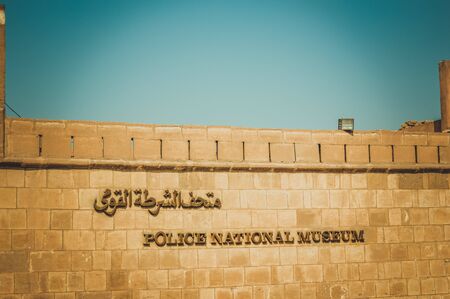 cairo, egypt, february 25, 2017: police national museum label on old wall at cairo citadelのeditorial素材