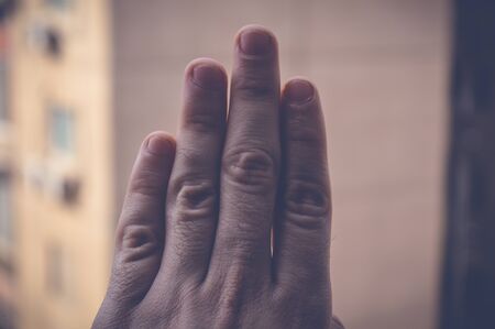 four fingers hand signの写真素材