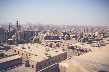 skyline of old buildings with view of mosque at cairo , egypt