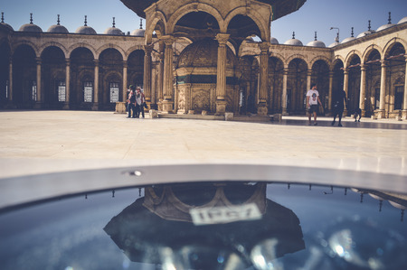 cairo, egypt, april 22, 2017: view inside muhammad ali mosque with reflection at cairo citadel