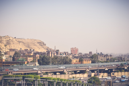 view of mountain with cars on road at cairo, egyptのeditorial素材