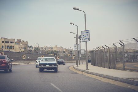 cairo, egypt, may 6, 2017: view of highway traffic at cairo ismaileya desert roadのeditorial素材