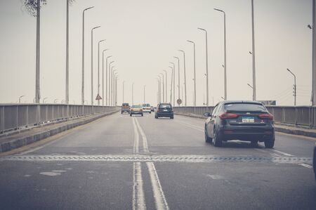 cairo, egypt, may 6, 2017: view of highway traffic at cairo ismaileya desert roadのeditorial素材