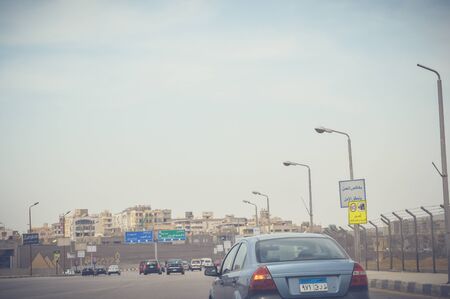 cairo, egypt, may 6, 2017: view of highway traffic at cairo ismaileya desert roadのeditorial素材