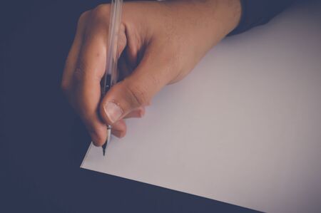 businessman writing on white paper in office, business concept