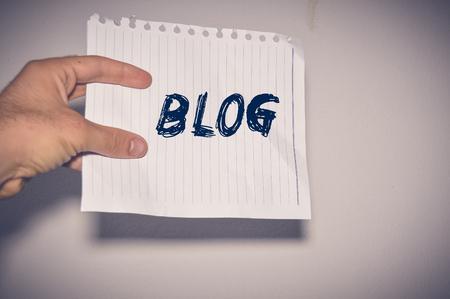 Blog written on white paper, technology conceptのeditorial素材