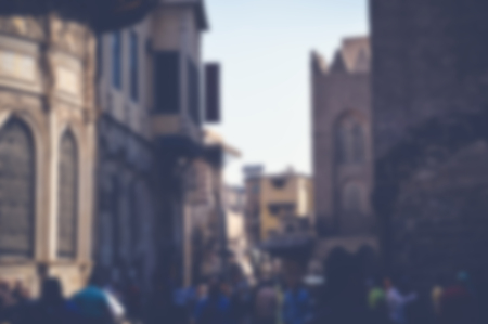 blurred background of people walking in the streetの写真素材