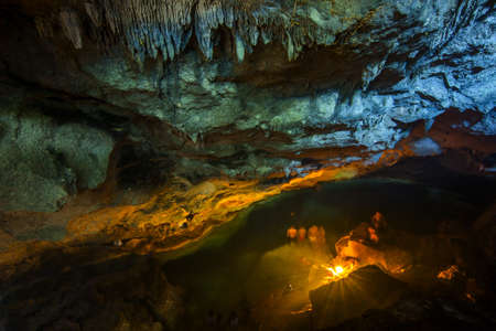 Clear water inside the caveの写真素材