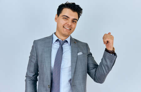 Young and  handsome businessman pointingの写真素材