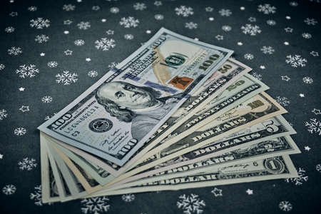 American banknotes and Christmas backgroundの写真素材