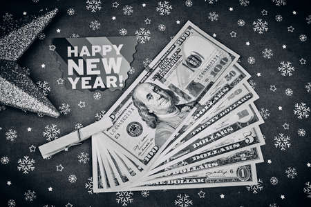 American banknotes and Christmas background in black and whiteの写真素材