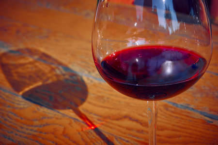 Glass of Fresh Red Wine for Celebrationの写真素材