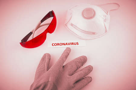 Coronavirus label next to protective wear