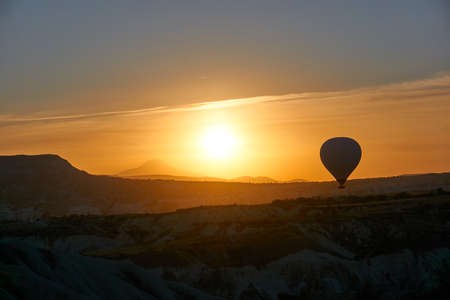 Hot air balloons at sunrise in Cappadocia, Turkeyの写真素材
