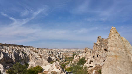 Ancient cave houses  and rock formations near Goreme, Cappadocia, Turkeyのeditorial素材
