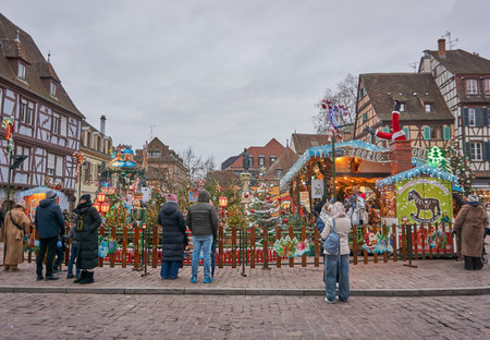 Colmar, France - December 24, 2025:Colmar is a popular destination for tourists, especially during the Christmas season. With its famous Christmas markets, festive lights, and iconic attractions such as the Ferris wheel, the city becomes one of Europeâsのeditorial素材