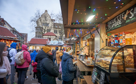 Colmar, France - December 24, 2025:Colmar is a popular destination for tourists, especially during the Christmas season. With its famous Christmas markets, festive lights, and iconic attractions such as the Ferris wheel, the city becomes one of Europeâsのeditorial素材