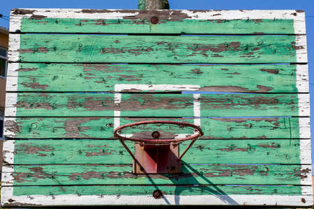 old basketball Hoop on a green shieldの写真素材