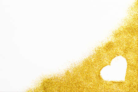 gold glittering background of glitter and heart shape. festive concept for Valentine's day, birthday, wedding, party, holidayの写真素材