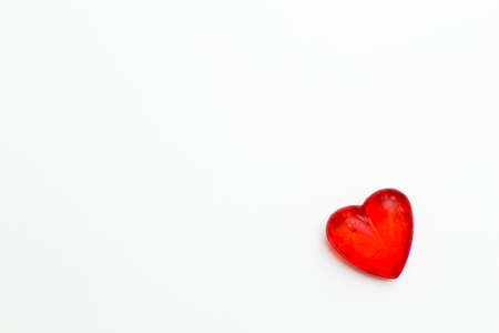 red heart on a white background. Festive background for the festival of birthday, Valentine's day, Christmas, new year.の写真素材