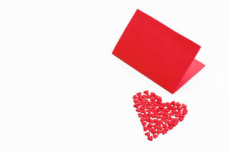 Valentine's day card with a small red heart on a white background. romantic love background for Valentine's day, birthday, holiday, weddingの写真素材
