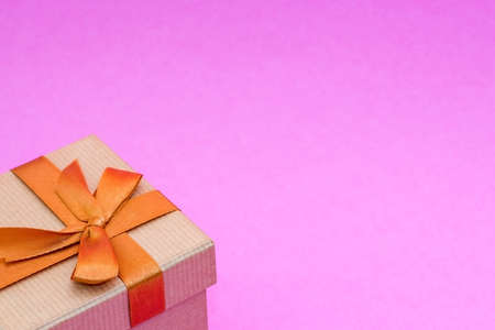 gift box on pink background. festive concept for Valentine's day, birthday, wedding, party, holidayの写真素材