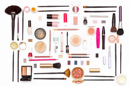 makeup cosmetics, brushes and accessories on white background. Top view. Flat lay. beauty concept.の写真素材